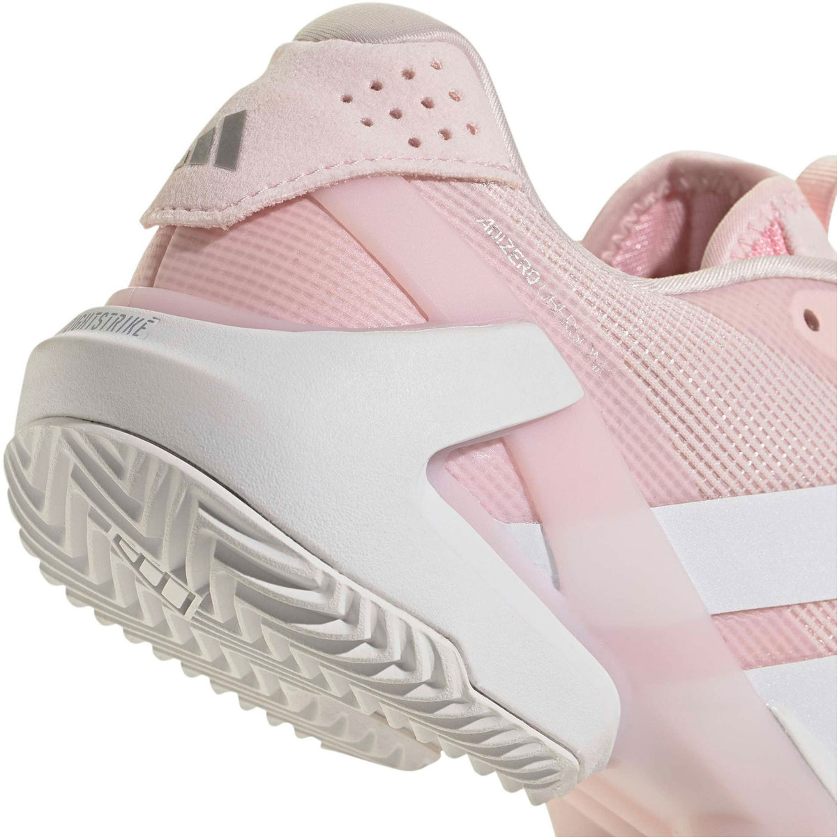 Close-up van de witte tussenzool en zoolrand van de Adizero Ubersonic 5 W