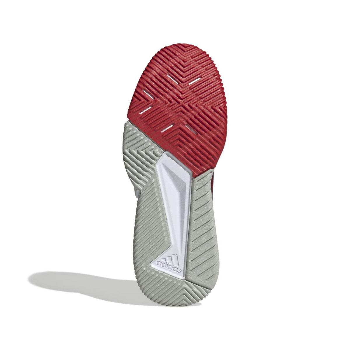 Witte zool van de Adidas Courtquick met rood profiel onder de voorvoet