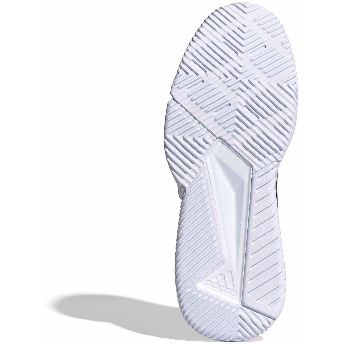 Onderzijde van de witte Adidas Courtquick met glad zoolprofiel