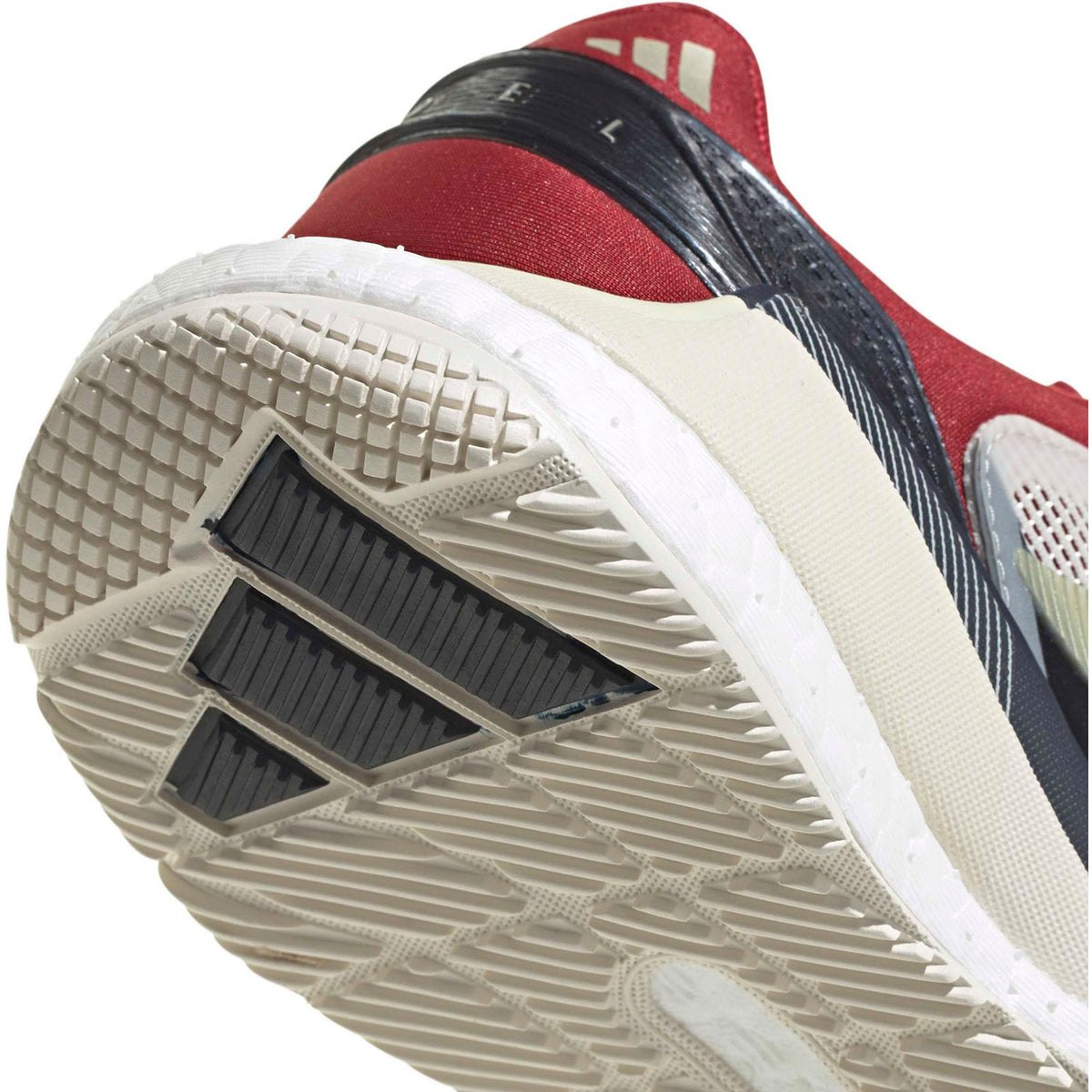 Close-up van de cremekleurige zool met donkergrijs profiel van de Crazyquick Boost W