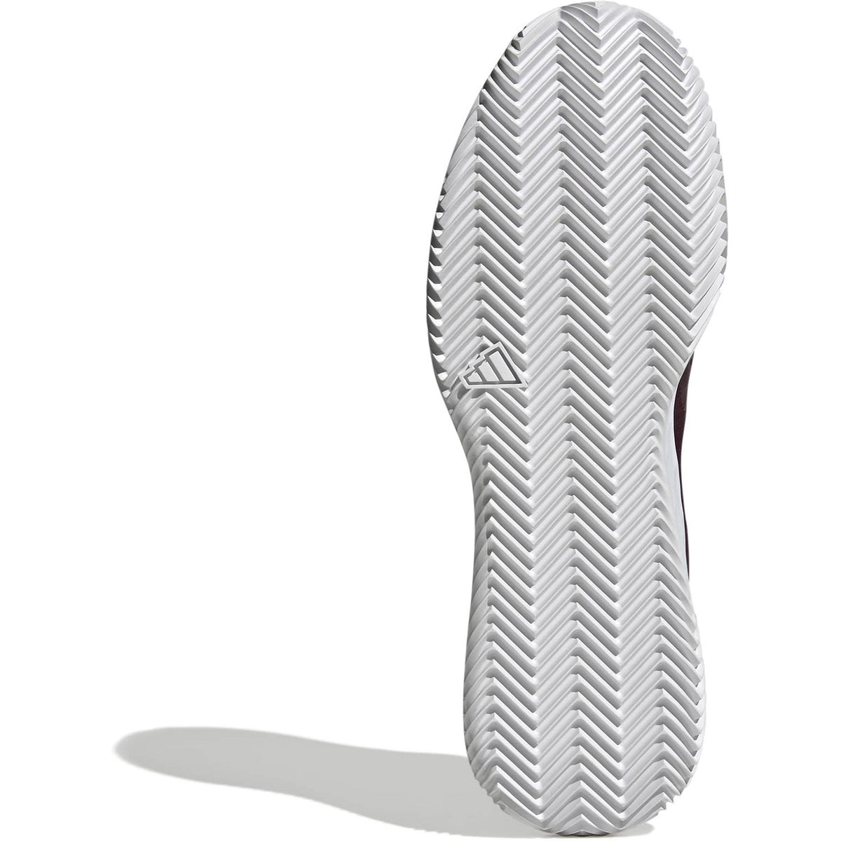 Witte zool van de bordeauxrode Adidas Defiant Speed 2 M CL met visgraatprofiel