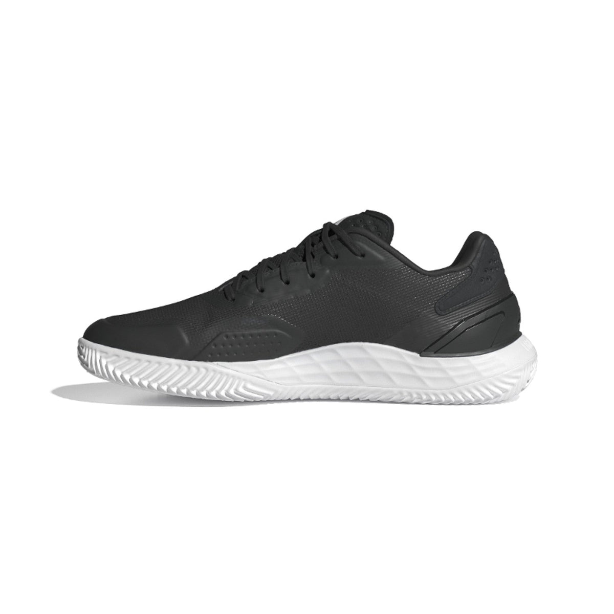 Inside of the black Adidas Defiant Speed M with a white midsole