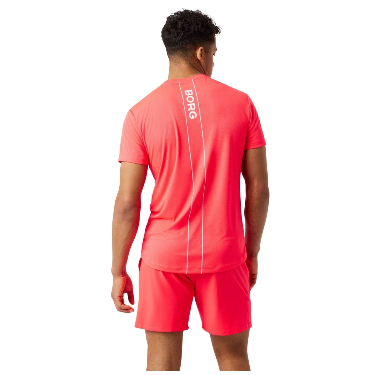 Achterzijde van het koraalroze Ace Light T-shirt met BORG-print