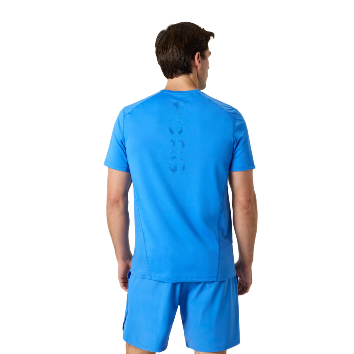 Achterzijde van het helderblauwe Bjorn Borg Ace Mesh Panel T-shirt op model