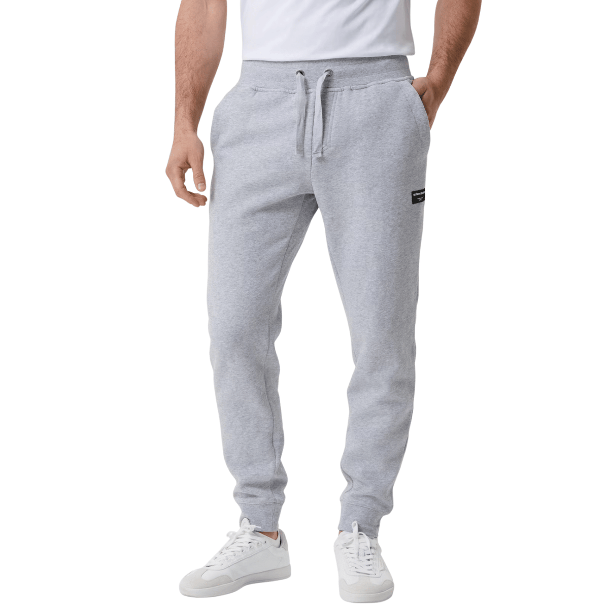 Vooraanzicht van de lichtgrijze Bjorn Borg Centre Tapered Pants met trekkoord en steekzakken