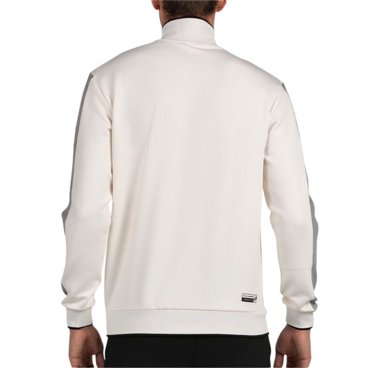 Achterzijde van het gebroken witte Bullpadel Jacket Pindaro met opstaande kraag
