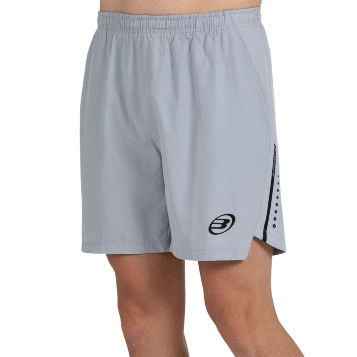 Schuin aanzicht van de lichtgrijze Bullpadel Short Mazari met donkere zijsplit