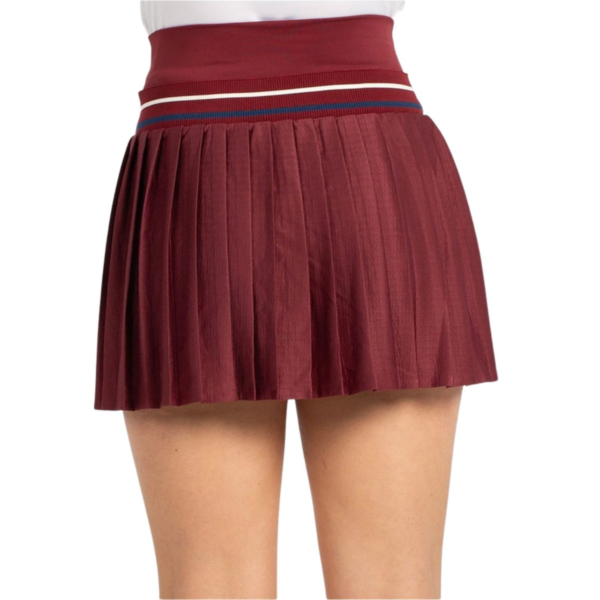 The back of the burgundy Bullpadel Atria skirt with a wide waistband and pleats