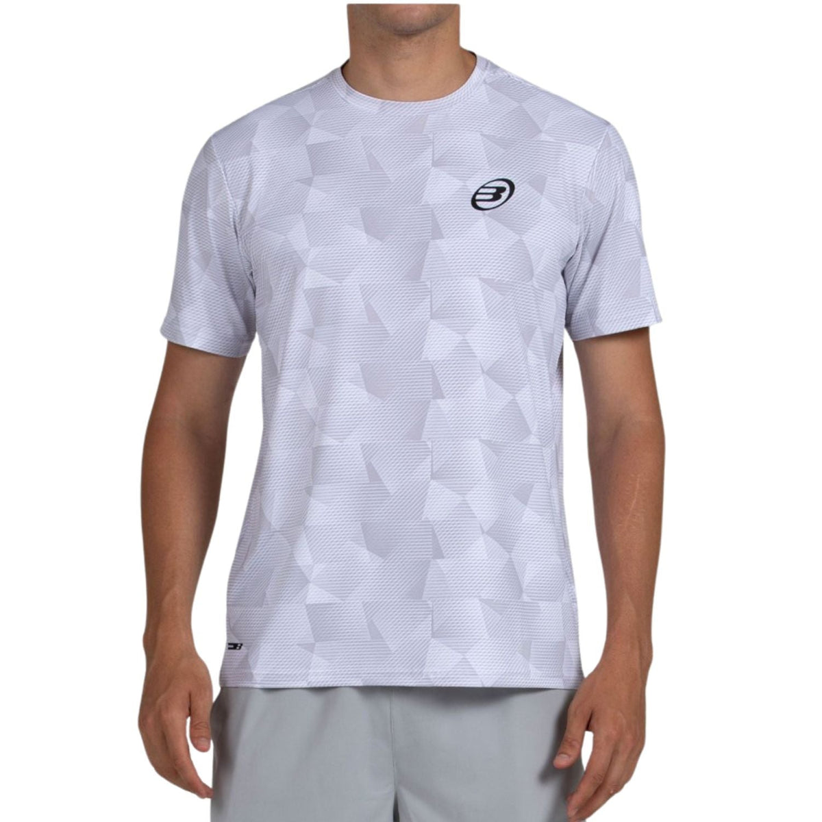 Vooraanzicht van het witte Bullpadel T-Shirt Macondo met toon-op-toon vlakkenprint