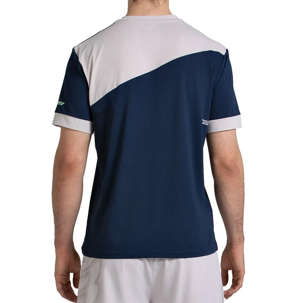 Achterzijde van het donkerblauwe Bullpadel Mananu T-shirt met wit schoudervlak