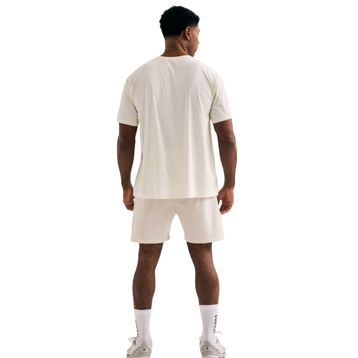 Bagfra af en model i Cuera WPC Light Weight T-shirt i farven Off White/Walnut