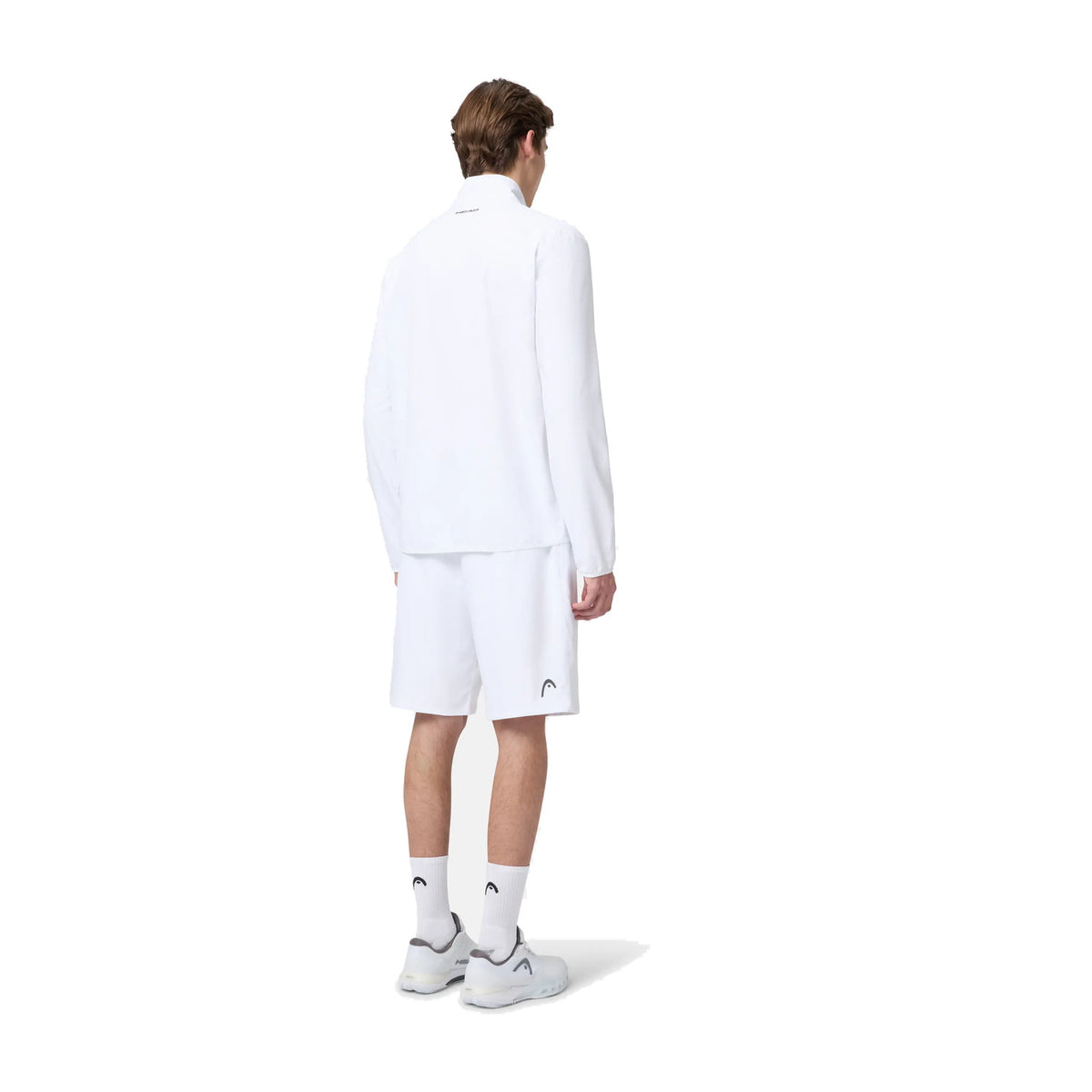 Model draagt het Head Club 25 Jacket in White - achteraanzicht ten voeten uit
