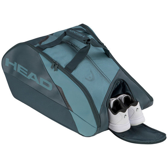 Grijsgroene Head Tour L racketbag met geopend zijvak en witte sportschoenen erin
