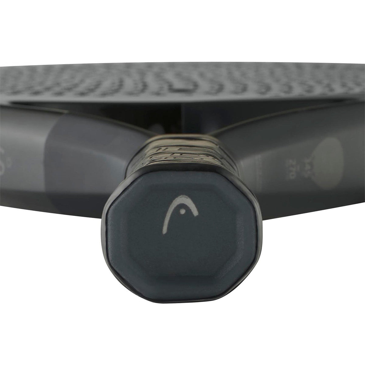 Close-up van de onderkant van de zwarte grip van het Head Speed One X 2025 met HEAD-dop