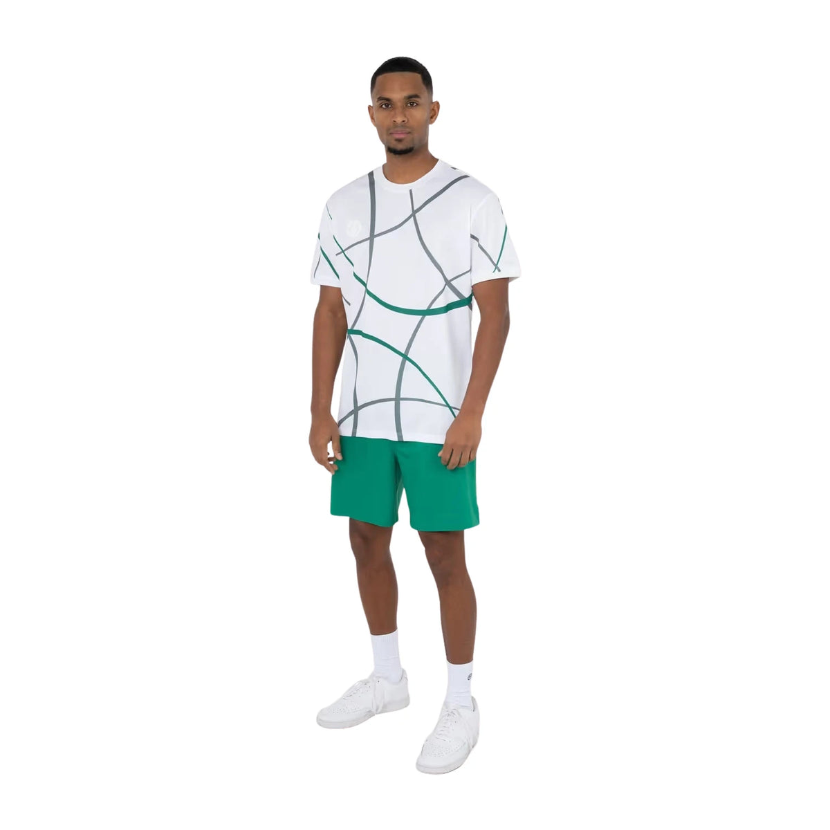 Model draagt de complete Indian Maharadja Smash Lush Green Set: Indian Maharadja Pique Smash Tee Lush Green Print met Indian Maharadja Ripstop Short Lush Green