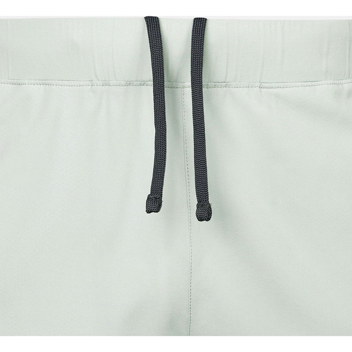 Detail van de tailleband van de mintgroene JDH Performance Short met donker trekkoord