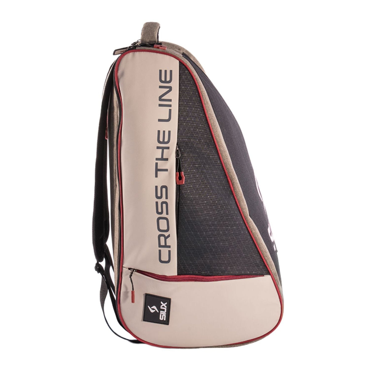 Zijaanzicht van de beige Siux Trail 2026 racketbag met creme flank en opdruk Cross The Line