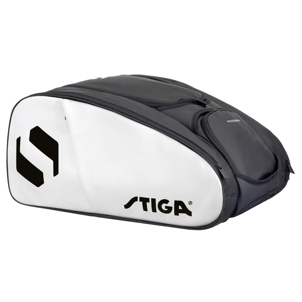Side view of the black-and-white Stiga Court racket bag with the logo on the left and a black side pocket