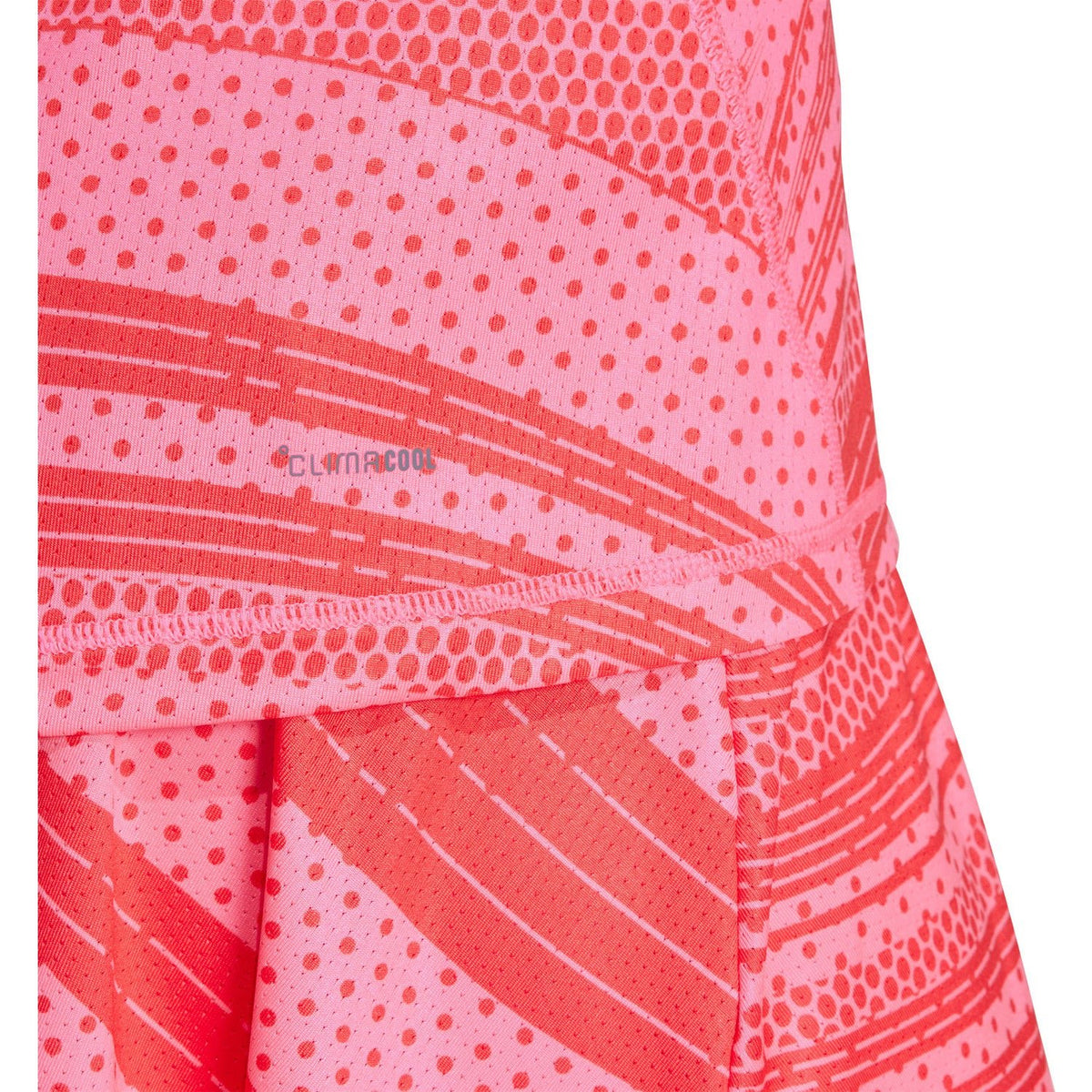 Detail van het roze stippen- en streepdessin van de Adidas Club Graphic Tank