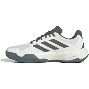 Binnenzijde van de cremekleurige Adidas Courtjam Control 3 M met grijze zool