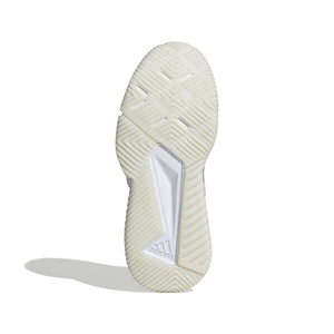 Smalle cremekleurige zool van de Adidas Courtquick W met vlak profiel