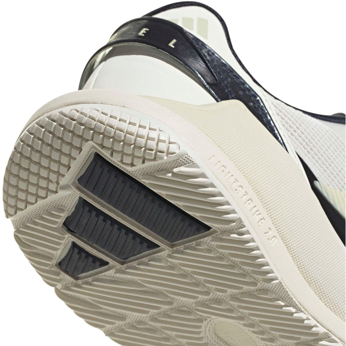 Close-up van de zool en donkerblauwe hielpartij van de Adidas Crazyquick LS W