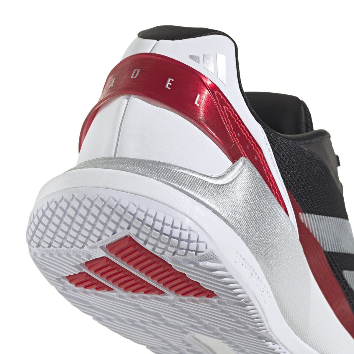 Detail van de witte tussenzool met rode streep van de Adidas Crazyquick LS