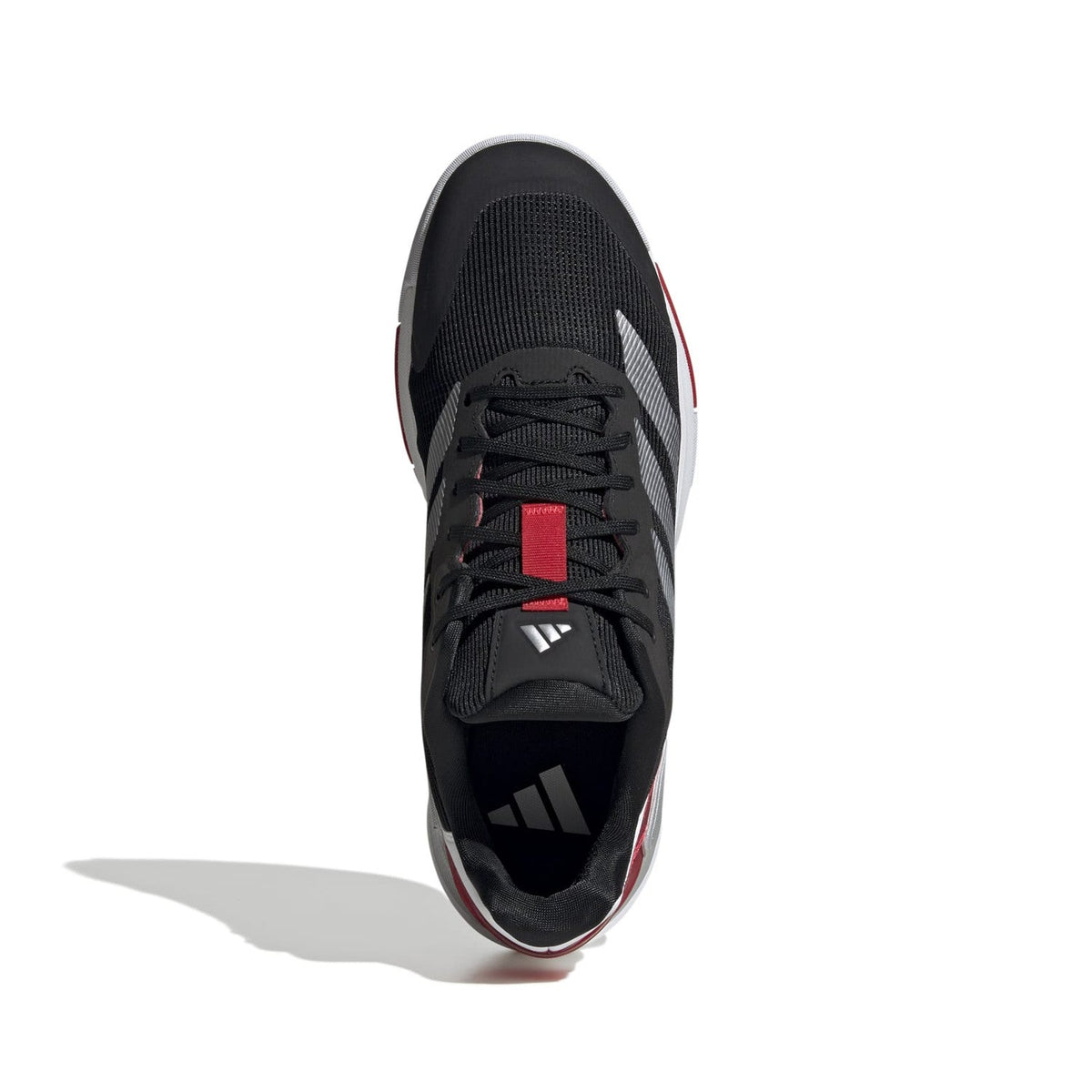 Bovenaanzicht van de zwarte Adidas Crazyquick LS met rode streep op de tong