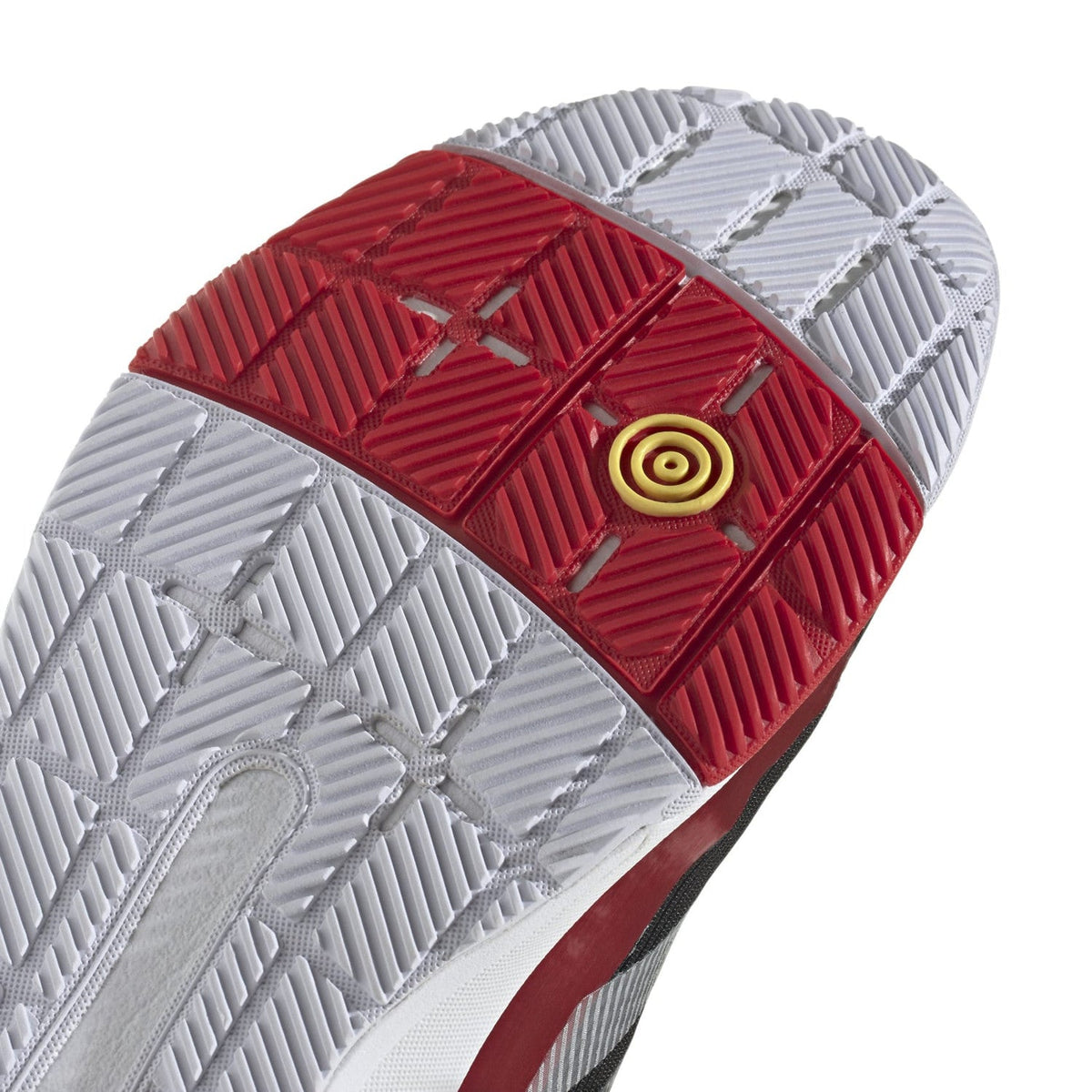 Close-up van het witte zoolprofiel met rode markering van de Adidas Crazyquick LS
