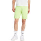 Adidas Ergo short voor heren in limoengroen, gedragen vooraanzicht