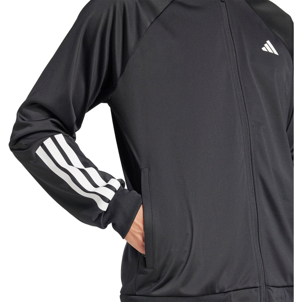 Detail van de mouw van het zwarte Adidas 3-Stripes jack met drie witte strepen