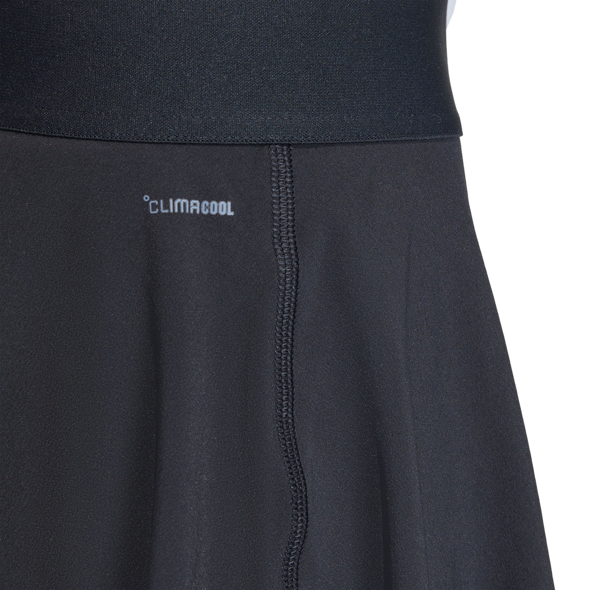 Detail van de tailleband met Climacool-opdruk van de zwarte Match rok