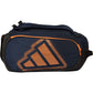Zijaanzicht van de marineblauwe Adidas Racket Bag Protour 2026 met koperkleurig logo.
