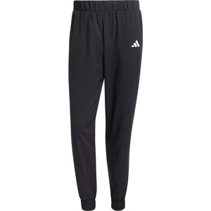 Productfoto van de losse zwarte Adidas Walk On trainingsbroek met wit logo op de pijp