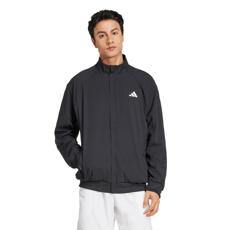 Zwart Adidas Walk On jack vooraanzicht gedragen met witte broek