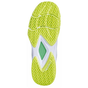 Zool van de Babolat Jet Ritma Women met limegeel visgraatprofiel en groene middenzool voor kunstgras