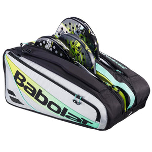 Zwarte Babolat RH Pro met mintgroen en twee padelrackets in het bovenvak