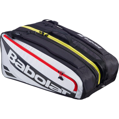 Babolat RH Pro rackettas in zwart-wit met rode en gele ritsen, zijaanzicht