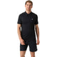 Model draagt de Bjorn Borg Ace Mesh Panel polo voor heren in zwart met short