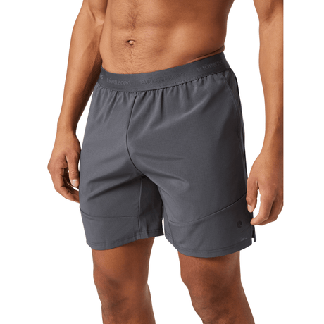 Vooraanzicht van de grijze Bjorn Borg Ace Pro short met zijzak en splitjes in de zoom