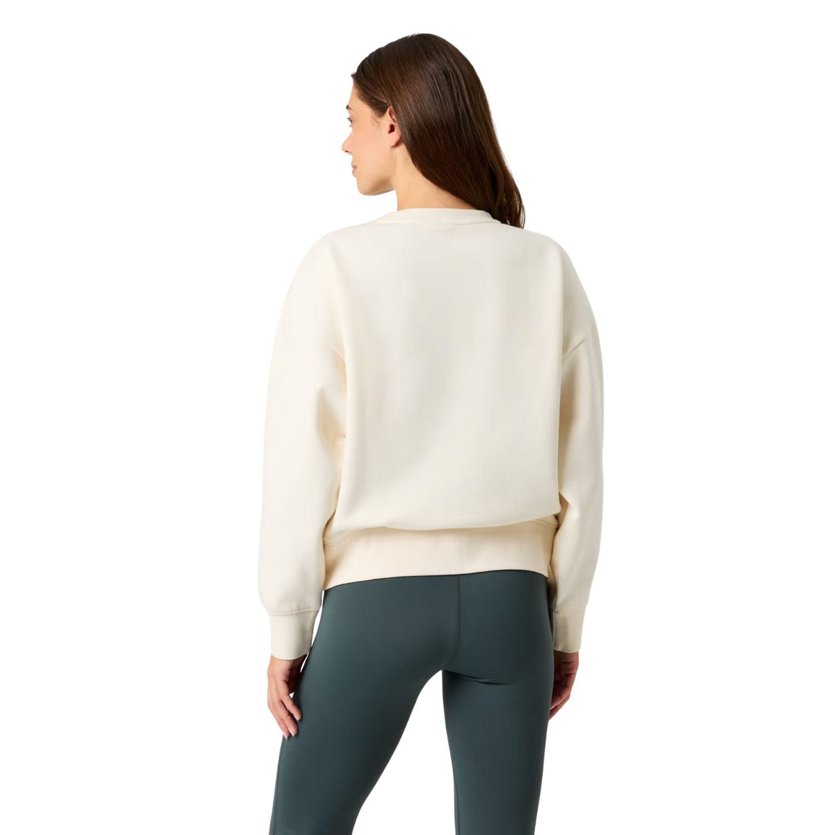 Achterzijde van de beige Bjorn Borg sweater met legging op model