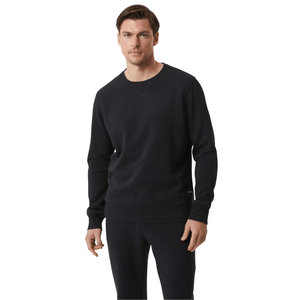 Vooraanzicht van herenmodel in de zwarte Bjorn Borg Centre Crew sweater met joggingbroek