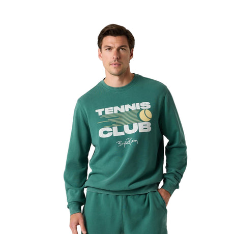 Herenmodel draagt het donkergroene Bjorn Borg Classic Print Sweatshirt met groene broek