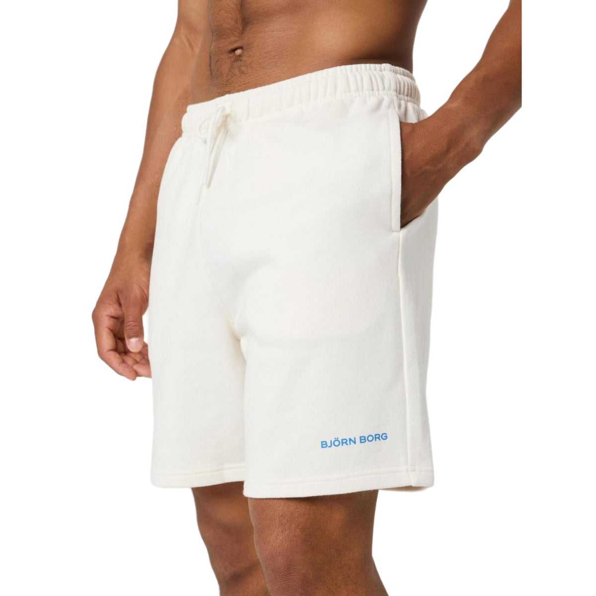 Zijaanzicht van de gebroken witte Bjorn Borg Classic Sweatshorts met logo op de pijp
