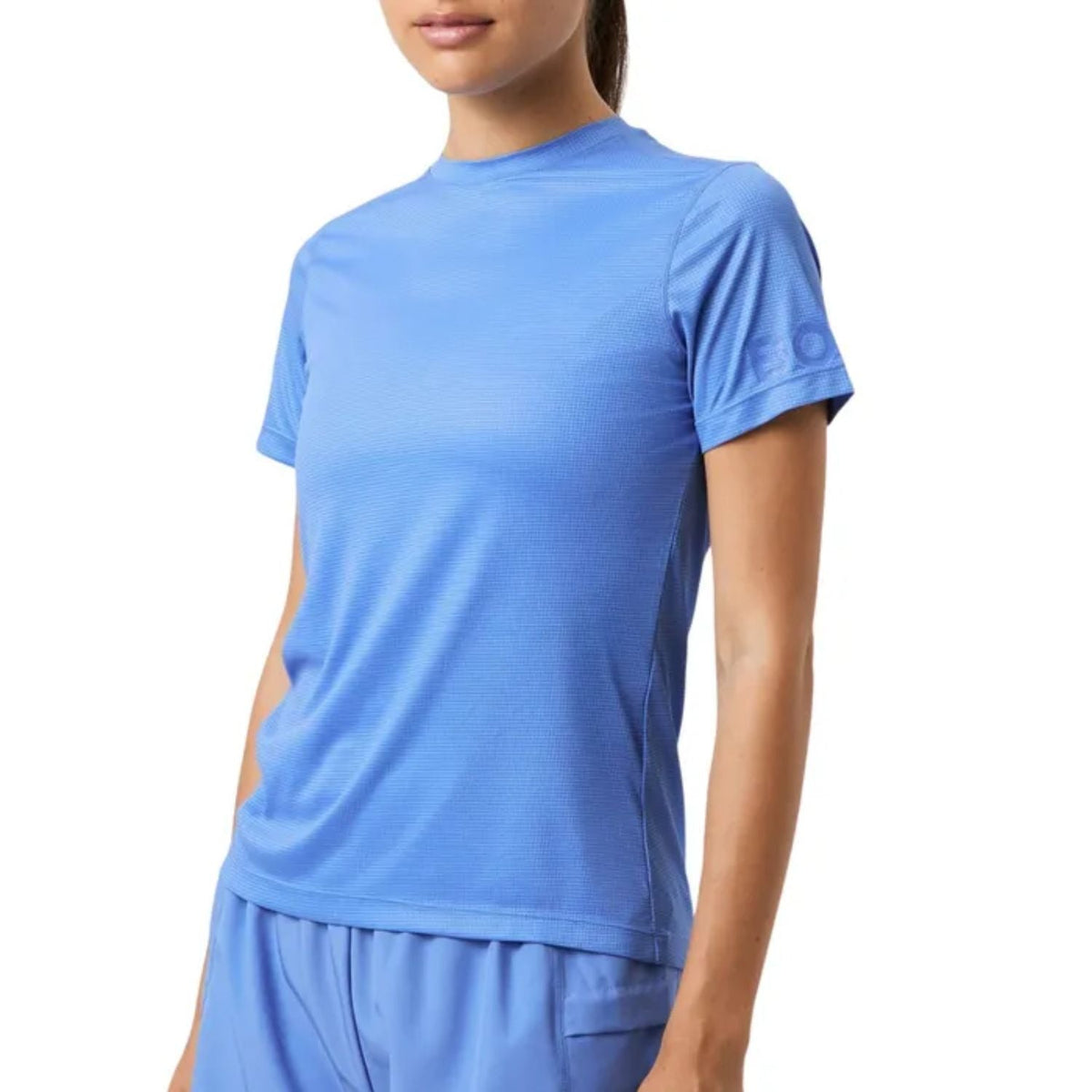 Detail van de ronde hals en korte mouwen van het blauwe Bjorn Borg Light W T-Shirt