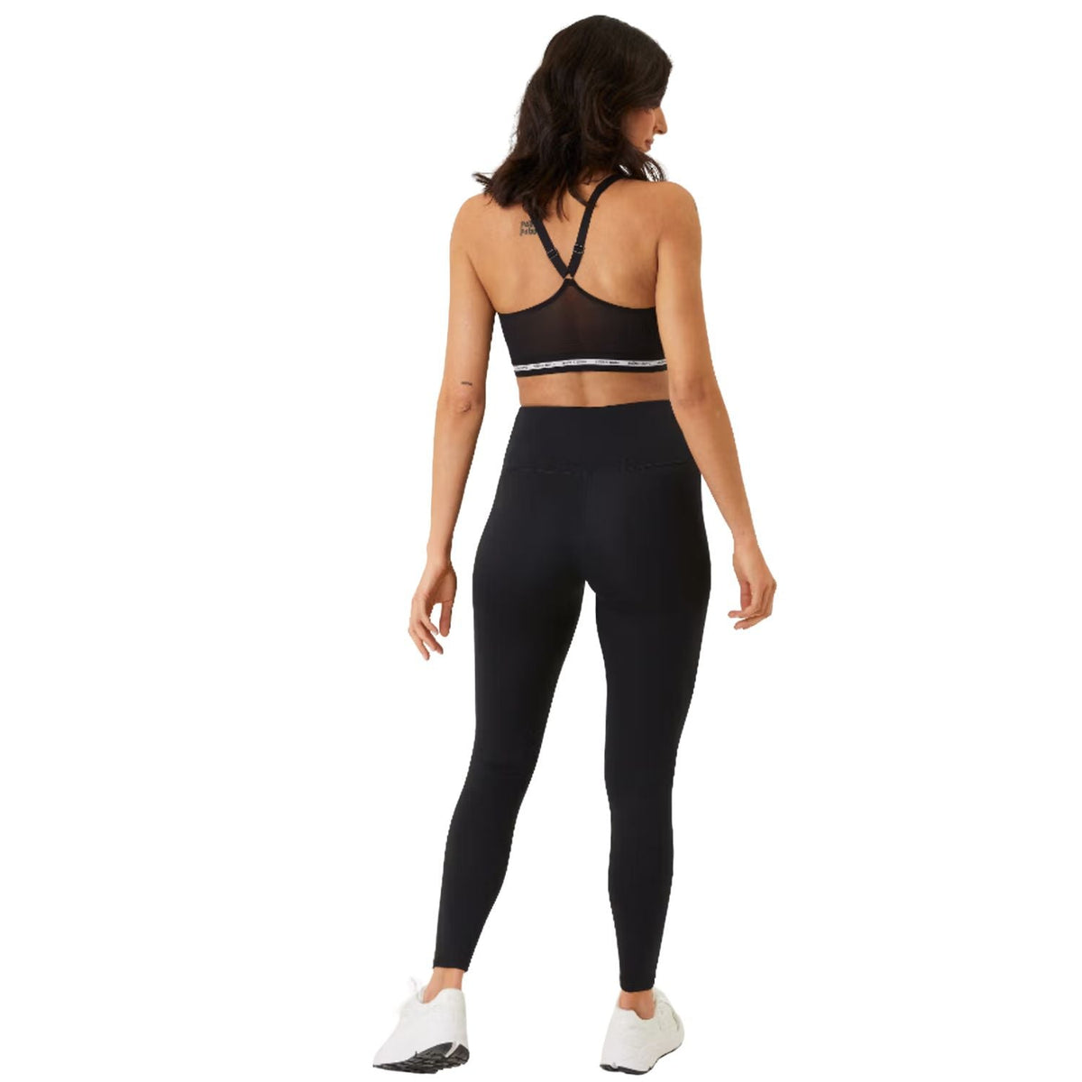 Achteraanzicht van de zwarte Bjorn Borg Logo Tights met hoge taille en sportbeha