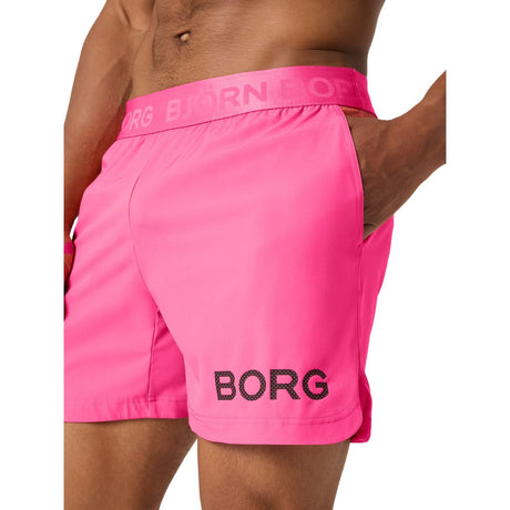 Bjorn Borg Short Shorts voor heren in felroze, zijaanzicht met hand in de zak