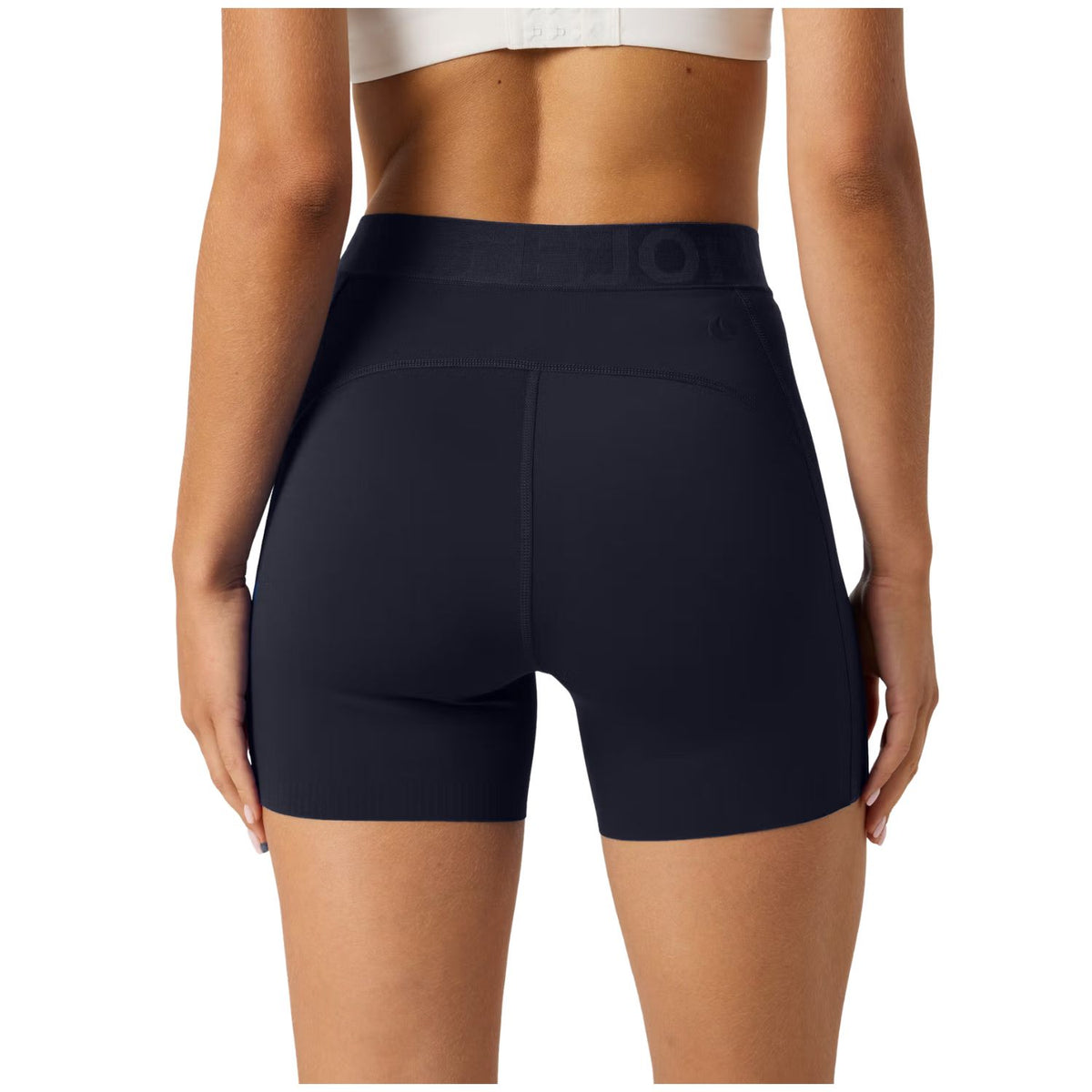 Achteraanzicht van de donkerblauwe Bjorn Borg korte legging met BORG-taille