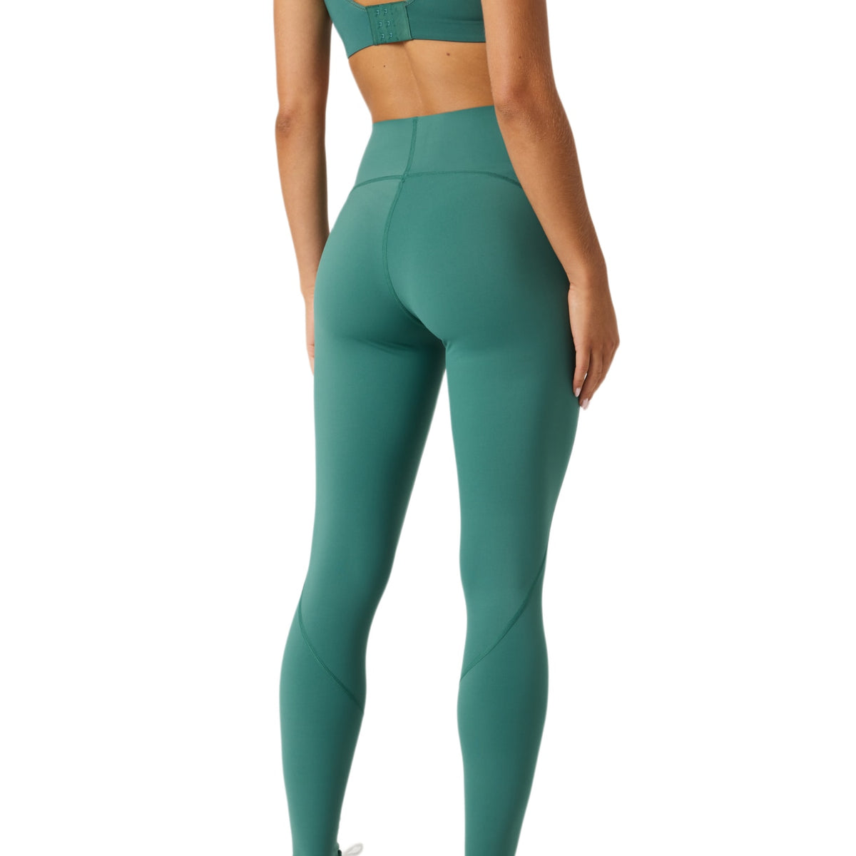 Achterzijde van de groene Bjorn Borg Sleek legging op model