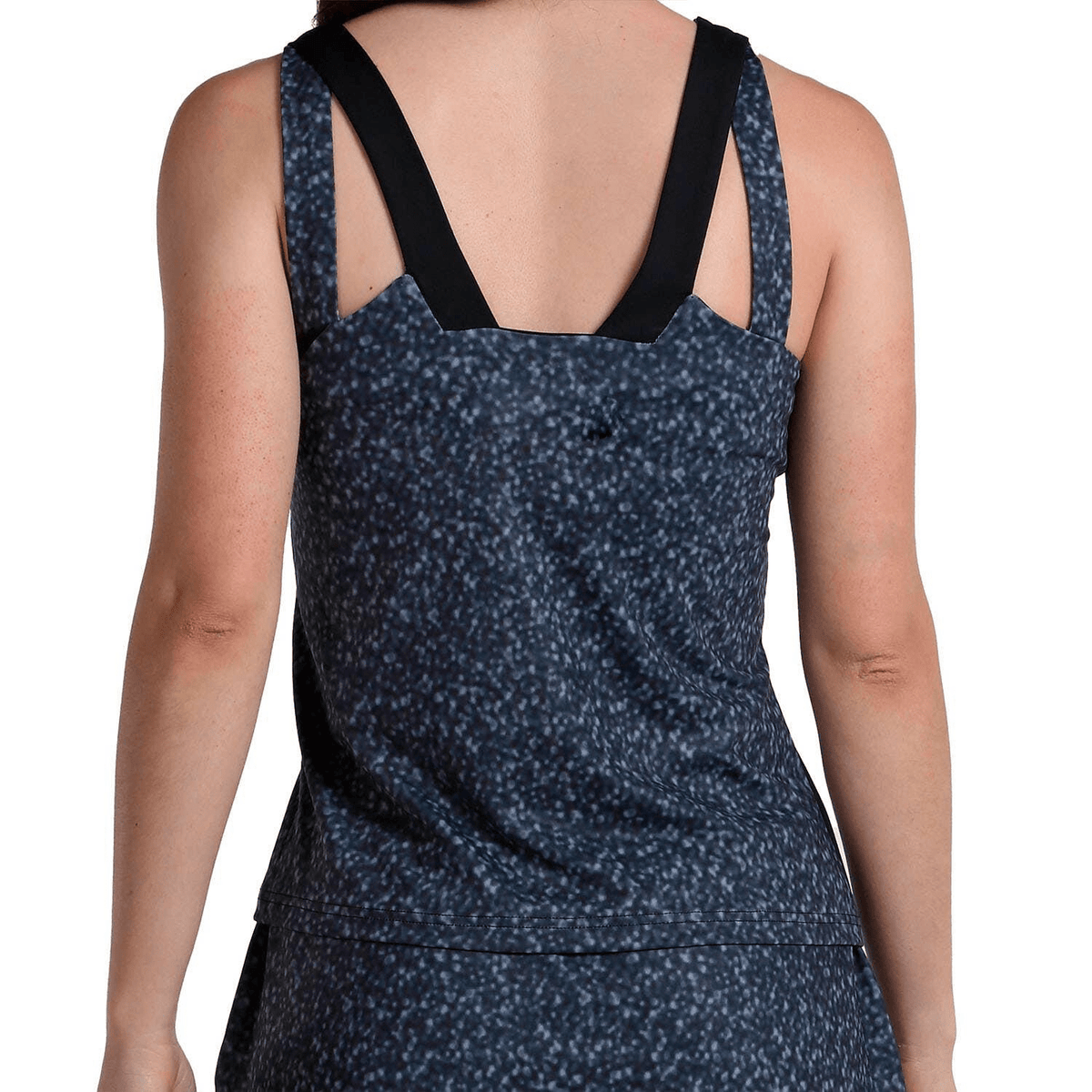 Rugzijde van de Bullpadel Brete top met blauw gespikkelde print en brede bandjes